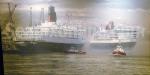 ID 5901 QUEEN VICTORIA (2007/90049grt/IMO 9320556) - this painting of the now out-of-service QUEEN ELIZABETH II (L) and the Cunard flagship QUEEN MARY 2 in Southampton, hangs on a staircase aboard QUEEN...