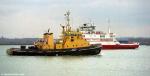 ID 8483 RMAS BUSTLER (1981/450tons, ex-SD BUSTLER) - an Adept-class tug based at Portsmouth, England passes inbound to Southampton as the outbound Red Funnel ferry RED OSPREY heads to Cowes on the Isle of...