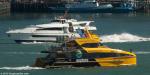ID 11038 D6 - the Explore Group ferry passing rival Fullers vessel JET RAIDER while on her way to the Auckland downtown ferry terminal. Since this picture the Explore Group ferry service has closed, the...