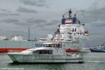 ID 10811 DEODAR III - the crew of Auckland's high-speed police launch, take a quiet moment from patrol to check out the heavy transport semisubmersible vessel YACHT EXPRESS, with superyachts aboard, as she...