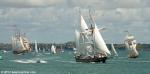 ID 9315 YOUNG ENDEAVOUR and R. TUCKER THOMPSON leading the tall ships OOSTERSCHELDE and EUROPA along the Rangitoto Channel past Auckland's East Coast Bays.