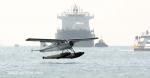 ID 11710 AUCKLAND SEAPLANES - the pilot of the 1961-built de Havilland Beaver floatplane eases back the throttle for another touchdown on Auckland's increasingly busy weekend harbour. In the background here,...