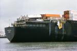 ID 8550 TOKIO EXPRESS (1973/57802grt/IMO 7232822, ex-SCANDUTCH EDO). Damaged containers dangle overboard as TOKIO EXPRESS docks in Southampton, UK after being hit by a rogue wave during a storm off the...
