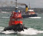 ID 10325 2016 AUCKLAND ANNIVERSARY DAY REGATTA TUG AND TOWBOAT RACE. MAHIA (Thomson Towboats) surges to the finish line ahead of the vintage steam tug WILLIAM C. DALDY (1935/348grt/IMO 5390345). 

