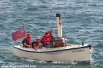 ID 10336 2016 AUCKLAND ANNIVERSARY DAY REGATTA TUG AND TOWBOAT RACE. 3 men in a boat named VICTORIA. Not a participant in the race this charming little steamer is based at the Voyager National Maritime Museum...