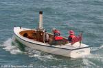ID 10352 2016 AUCKLAND ANNIVERSARY DAY REGATTA TUG AND TOWBOAT RACE. 3 men in a boat named VICTORIA. Not a participant in the race this charming little steamer is based at the Voyager National Maritime Museum...