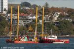 ID 12425 DMK - an Auckland-based pusher tug operated by Heron Construction, seen here outbound from Auckland with a drilling rig to commence work at Bean Rock Lighthouse in the entrance to the Waitemata...