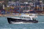 ID 13319 TONIC, a Beneteau Swift Trawler 42, a rare boat in NZ waters, seen here powering past Devonport Wharf.