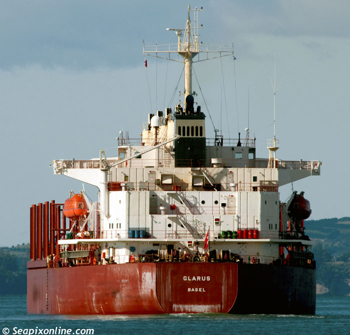 GLARUS (2001/27011grt/46513dwt/IMO 9220471) outbound from Auckland, New Zealand with a load of ironsand bound. The Swiss-flagged bulk carrier was bound for Port Kembla, Australia. In 2018 she was hijacked in Nigerian waters and 12 of her 19 crew were kidnapped for ransom. She is owned and managed by Massoel Shipping of Geneva. 19 APRIL 2012. Photo by SeapixOnline.com