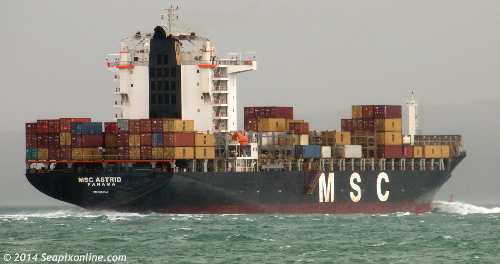 MSC ASTRID (2004/35954grt/32119dwt/IMO 9263344, ex-NORTHERN DISTINCTION, MSC DELHI) sails from Auckland in choppy conditions bound for Brisbane, Australia. 6 October 2014. Photo by Â© 2014 SeapixOnline.com