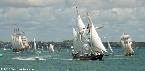 YOUNG ENDEAVOUR and R. TUCKER THOMPSON leading the tall ships OOSTERSCHELDE and EUROPA along the Rangitoto Channel past Auckland's East Coast Bays. 28 October 2013. Photo by Â© 2013 SeapixOnline.com