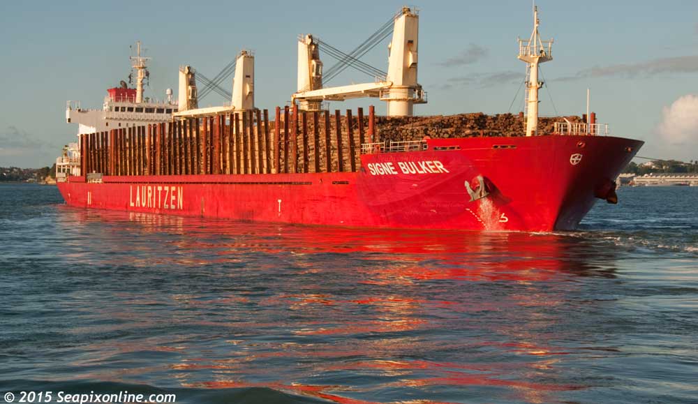 SIGNE BULKER (2010/20809grt/32755dwt/IMO 9497165) sails from Auckland's Wynyard Wharf. En-route to China from Napier with a full load of milled timber and raw logs, she stopped over in Auckland for a 5-hour bunkering call. She is owned and managed by Lauritzen Bulkers of Copenhagen, Denmark. 19 April 2015. Photo by Â© 2015 SeapixOnline.com