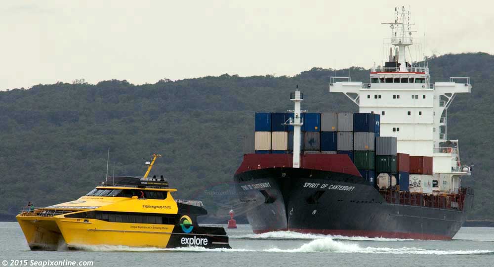 SPIRIT OF CANTERBURY (2005/9910grt/1118-TEU/IMO 9319557, ex-SEA PIONEER, OLYMPIAN RACER, SINOTRANS TOKYO) - Pacifica Shipping's Turkish-built container ship arriving in Auckland from Tauranga for the second time. She has replaced NINGPO on the ESEA service in providing a weekly rotational service between Auckland, Lyttelton, Nelson, Tauranga, Auckland. Owned and manged by China Navigation Co Ltd of Singapore. Explore Group's high-speed ferry D5 passes ahead of her inbound to Auckland City from Waiheke Ialand. 9 April 2015 . Photo by Â© 2015 SeapixOnline.com