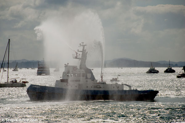 TAMAKI (1972/221grt/IMO 7226550) - one of Ports of Auckland's older tugs displays her fire-fighting water monitors following the Anniversary Day Regatta tug race. 28 January 2013. Photo by Â© SeapixOnline.com