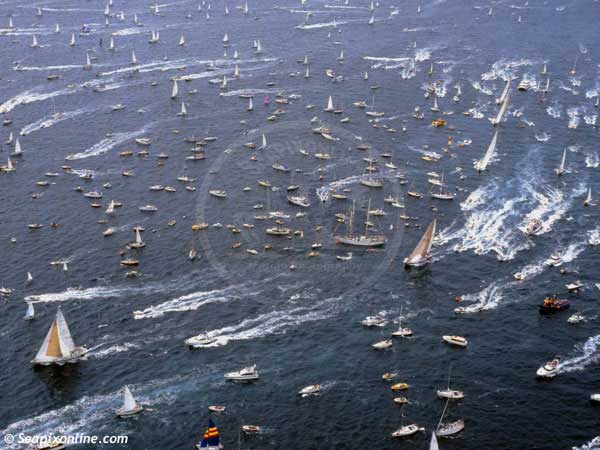 WHITBREAD ROUND THE WORLD RACE 1981/2 - 
The leg from Auckland to Mar del Plata had begun and Auckland gave the fleet the usual rapturous send-off.
Here the fleet rounds the sail-training ship SPIRIT OF ADVENTURE (centre) before heading north-east to pass Great Barrier Island and head out into the Pacific and the Southern Ocean. 1982. Photo by SeapixOnline.com/Trevor Coppock