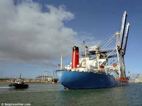ZHEN HUA 2 (1971/26775grt/IMO 7123928, ex-BULK TOPAZ, NORMAN VENTURE, JAGUAR) arriving in Auckland, New Zealand with two new container cranes for Ports of Aucklands' Axis Ferguson Container Terminal. 2003. Photo by SeapixOnline.com