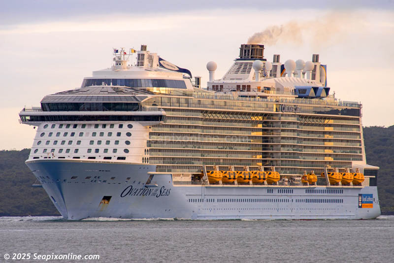 Royal Caribbean's OVATION OF THE SEAS (2016 / 168666grt / IMO 9697753 / 348m loa) having come north from Tauranga arrived into Auckland just an hour after SEVEN SEAS EXPLORER. 
Too large to berth at the normal cruise ship terminals of Princes or Queens wharfs, she was turned in mid-harbour and came alongside the northern berth of the Fergusson Container Terminal. 3 January 2025. Photo by Â© 2025 SeapixOnline.com