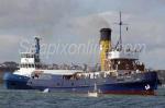 ID 5115 WILLIAM C. DALDY (1935/348grt/IMO 5390345) and her successor, the operational Ports of Auckland tug DALDY (1977/226grt/IMO 7519127) manoeuvre in the starting area of the 2009 Auckland Anniversary Day...