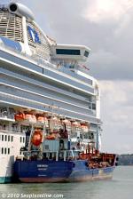 ID 6100 AWANUIA (2009/2747gt/IMO 9458042) - dwarfed by her customer, the new Ports of Auckland bunkering tanker AWANUIA, pumps fuel aboard Princess Cruises DIAMOND PRINCESS(2004/115875grt/IMO 9228198),...