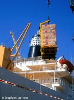 ID 7131 SNOW CRYSTAL (1973/14512grt/IMO 7321075) discharges oranges and grapefruit at the Canary Islands Fruit Terminal, Southampton, England. Flying the flag of the Cook Islands when she was broken up in...