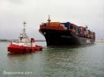 ID 6727 ESSEN EXPRESS (1993/53815grt/IMO 9036909) sails from Southampton escorted by the Red Funnel tug HAMTUN.