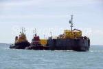 ID 5081 MARSDEN BAY (ex-JUTA 1) - an 1800 tonne capacity cement carrying barge operated by Golden Bay Cement of New Zealand, is towed by the dedicated tug KORAKI (1985/125grt) on left, between the company's...
