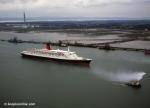 ID 7107 QUEEN ELIZABETH 2 (1969/70327grt/IMO 6725418) passing the Fawley Refinery inbound to Southampton, England from a German shipyard where repairs were made to damage sustained when she ran aground in...