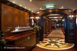 ID 6794 QUEEN ELIZABETH (2010/90901gt/IMO 9477498) - Model of Queen Mary 2 (starboard entrance) and Queen Victoria (portside entrance) to the Commodore Club located forward on Deck 10. In the corridor here...