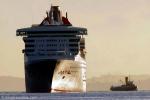 ID 5197 QUEEN MARY 2 (2003/148528grt/IMO 9241061) dwarfs the veteran steam tug WILLIAM C DALDY
(1935/348grt/IMO5390345) as she sails into Auckland, New Zealand soon after sunrise for her second visit to the...