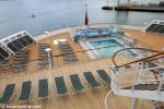 ID 5220 QUEEN MARY 2 (2003/148528grt/IMO 9241061) - The Minnows Pool at the stern on Deck 6 seen from Deck 8.