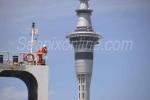 ID 5087 SUPER SERVANT 4 (1982/12642grt/IMO 8025343) a crew member takes in a view of Aucklands' Skytower as the semi-submersible operated by Dockwise Shipping B.V. of The Netherlands, arrives for bunkering at...