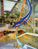 ID 7506 EXPLORER OF THE SEAS (2000/137308grt/IMO 9161728) - The nine deck-high Centrum and the entrance to The Royal Promenade.