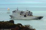 ID 9223 HMNZS CANTERBURY (L-421/9000grt) - the RNZN's Dutch-built multi purpose vessel puts to sea from Devonport Naval Base in her homeport of Auckland. She is seen passing Bean Rock lighthouse as she rounds...