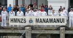 ID 10665 Crew of HMNZS MANAWANUI (AO9) on Princes Wharf watch the passing parade.