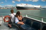 ID 8819 HOEGH TROVE (2000/58684grt/IMO 9186302, ex-HUAL TROVE, HUAL MARTITA, HUAL MARITITA) sailing from Auckland's Bledisloe Wharf bound for Chiba, Japan. Cross-harbour ferry passengers take in the close up...