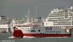 ID 8409 ISLAND NAVIGATOR (1988/351gt/IMO 8829323) - a vehicular ferry operated by Sealink, passes Aucklands' Hilton Hotel and Princes Wharf apartments en-route to Waiheke Island in the Hauraki Gulf. 