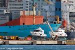 ID 10963 JOSEPHINE MAERSK (2002/30166grt/IMO 9215191) - two motor cruisers await loading aboard the container ship at Auckland.