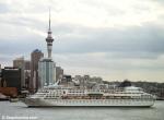 ID 7388 NORWEGIAN WIND (1993/50760grt/IMO 9008421, ex-WINDWARD. Renamed SUPERSTAR AQUARIUS. Named ARIUS prior to scrapping) outbound from Auckland passes the central city CBD office towers.