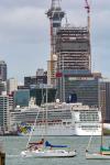 ID 11642 NORWEGIAN JEWEL (2005/93502grt/7500dwt/IMO 9304045) dwarfed by yet another growing tower currently under construction amid the insane chaos of downtown Auckland's CBD area.