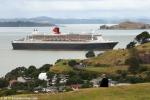 ID 10021 QUEEN MARY 2 (2003/148528grt/IMO 9241061) rounding North Head as she arrives in Auckland a day earlier than scheduled. Rough weather further south left in the trail of former Tropical Cyclone Pam...
