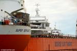 ID 7675 SUPER SERVANT 4 (1982/12642grt/IMO 8025343) a semi-submersible operated by Dockwise Shipping B.V. of The Netherlands, arriving at Wynyard Wharf, Auckland, NZ with the motor yacht CODENE aboard.