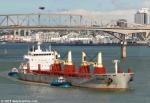 ID 10030 SWAKOP (2013/24341grt/34274dwt/IMO 9607447) makes for the Chelsea Sugar Refinery berth after transiting the Auckland Harbour Bridge, inbound from Acajutla, El Salvador. On her maiden all at the City...