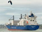 ID 10815 SEATRADE WHITE (24905grt/IMO 9756092) - Seatrade's brand new specialised reefer container ship is given a close inspection by a local kite surfer as she departs Auckland today following her maiden...