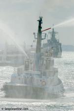 ID 8641 TAMAKI (1972/221grt/IMO 7226550) - one of Ports of Auckland's older tugs displays her fire-fighting water monitors following the Anniversary Day Regatta tug race.