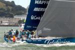 ID 7810 TEAM TELEFONICA - the Spanish entrant in the 2011/12 Volvo Ocean Race, heads down harbour as the fleet compete in the in-port practice racing.