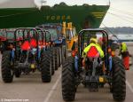 ID 8482 TOSCA (1978/45037grt/IMO 7708833. Scrapped 2010). Tractors lined up in the consolidation compounds at Southampton's Eastern Docks, about to be loaded aboard Wallenius Line's TOSCA.