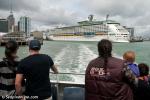 ID 8389 VOYAGER OF THE SEAS (1999/137276grt/IMO 9161716). The Royal Caribbean mega-cruise ship, making her maiden call at the port of Auckland, New Zealand, is seen from the cross-harbour commuter ferry KEA. 
