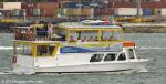 ID 12889 OCEAN GROOVE CRUISES - an Auckland-based charterboat inbound to St. Mary's Bay Z Pier.