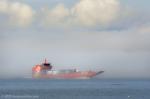 ID 12355 SEABRIDGE (2014/485grt) - an Auckland-based vehicular/passenger ferry inbound to Auckland's Sealink Ferry Terminal from nearby Waiheke Island, emerges from a dense bank of fog as she passes North...